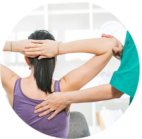 A chiropractor gently treating a patient